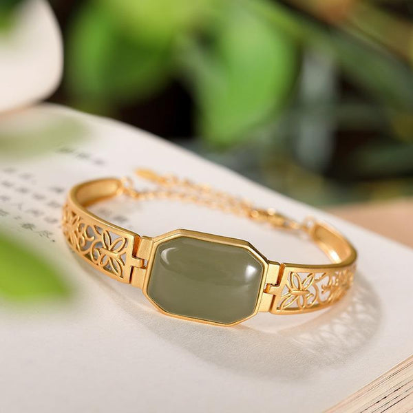 Pulsera de mariposa hueca de jade verde hetiano con diseño original y artesanía de oro antiguo