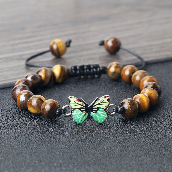 Pulseras de piedra natural para hombre, con lava negra, ojo de tigre y colgante de mariposa verde.