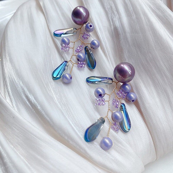 Pendientes colgantes de planta con perlas de cristal hechos a mano