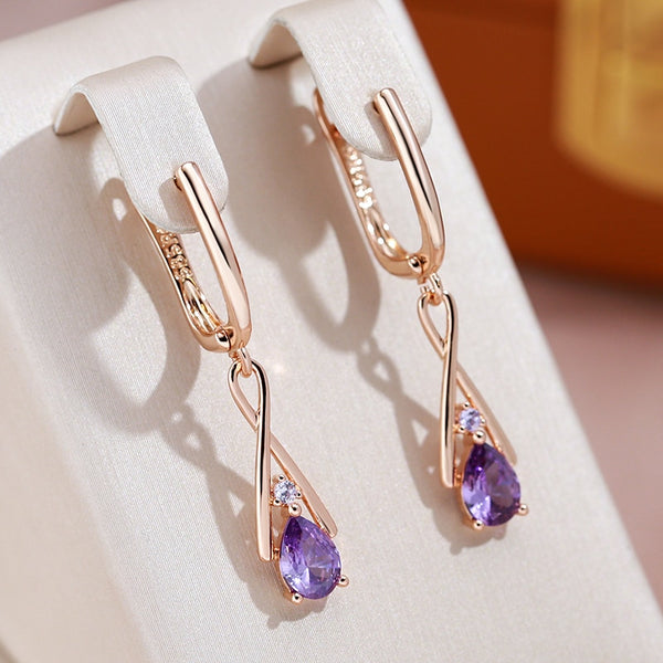 Pendientes colgantes de lujo con circonita morada y cruz para mujer