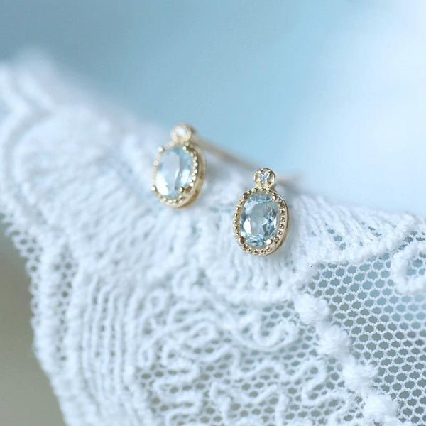 Designer original new Japanese compact and exquisite sky blue topaz earrings