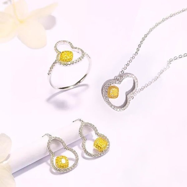 Conjunto de pendientes y anillo con colgante de calabaza y diamantes dorados bañados en plata S925