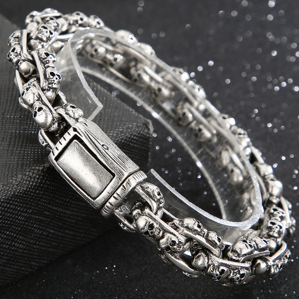 Pulsera gótica punk para hombre, estilo vintage, color plata antigua, de acero inoxidable, con cabeza de calavera y cadena de eslabones de esqueleto.