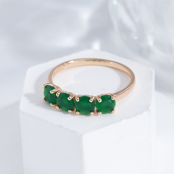 Anillo minimalista de circonita verde redonda de cuatro puntas para mujer
