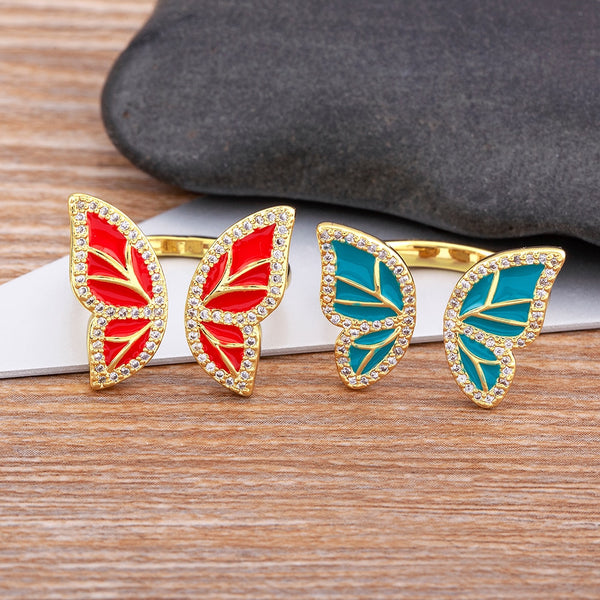 Anillo geométrico de alta calidad con diseño de mariposa y esmaltado con aceite.