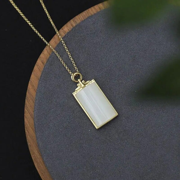 Nuevo colgante de jade blanco natural Hotan con incrustaciones de plata