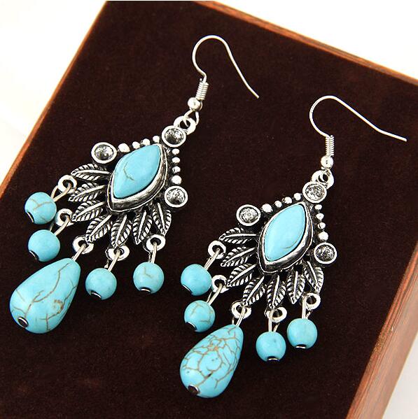 Pendientes largos con piedra azul y grandes pendientes llamativos