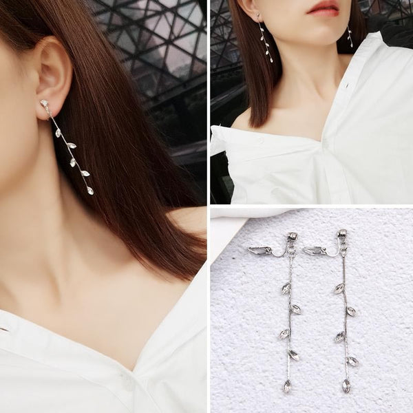 Pendientes de clip de lujo con diamantes de imitación dorados y borlas largas