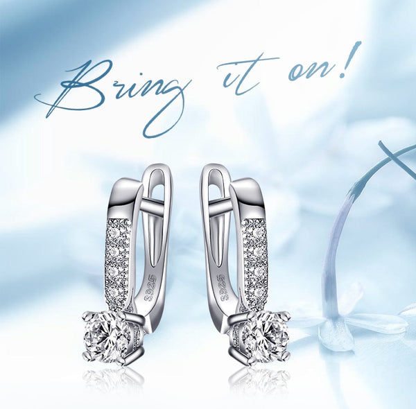 Pendientes de clip de plata de ley 925 para mujer, con circonitas cúbicas.