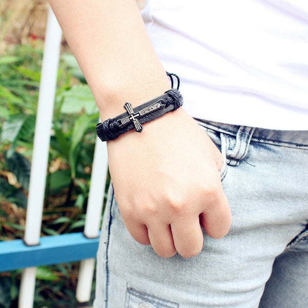 Pulsera vintage de cuero con cruz de Jesús en metal