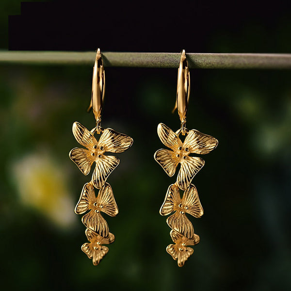 Pendientes colgantes de tres flores en plata de ley 925 y oro de 18 quilates para mujer.