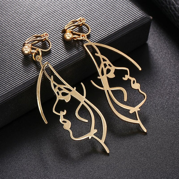 Pendientes de clip con cara hueca, elegantes y abstractos, para niñas.