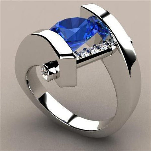 Anillos de compromiso de boda con circonitas de cristal redondas azules de color plata