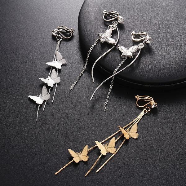 Pendientes clásicos de mariposa de circonita sin perforar para mujer