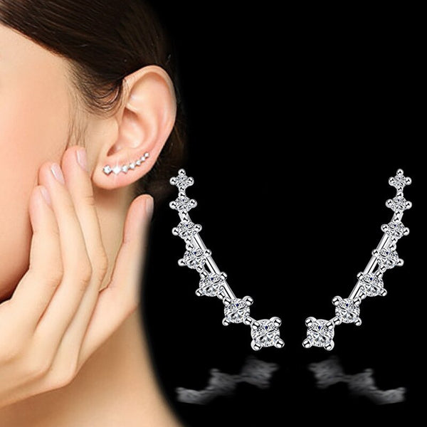 Pendientes de clip de circonita con siete estrellas y cuatro garras en plata de ley 925
