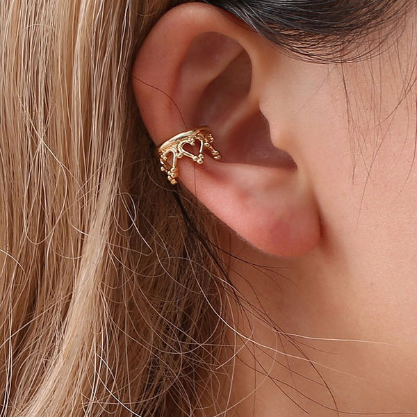 Nuevos y lindos pendientes de clip de aleación con diamantes de imitación y corona de flores estilo punk