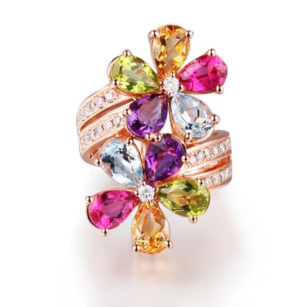 Anillo de oro rosa de lujo con delicados cristales de circonita cúbica multicolor.
