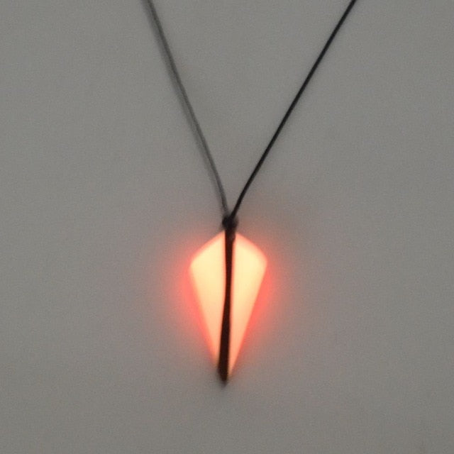 luminous necklace pendant at night
