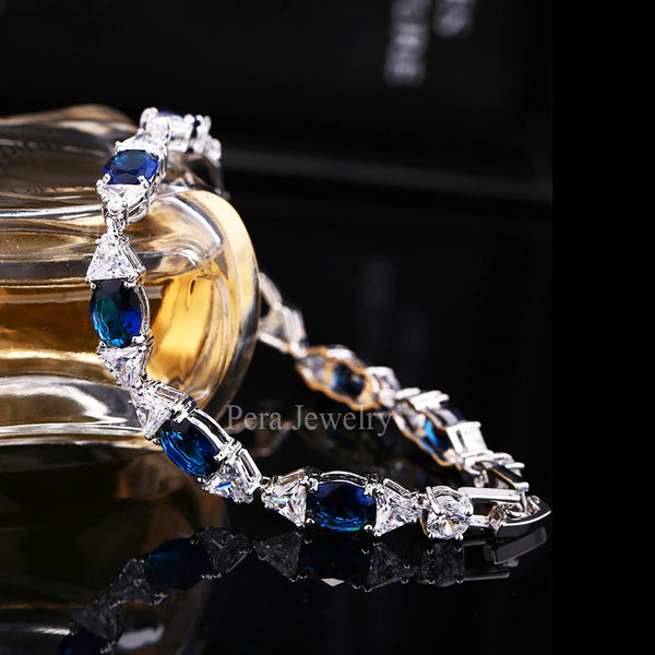 Pulseras de cadena de eslabones con dijes redondos grandes de circonita cúbica marquesa azul claro