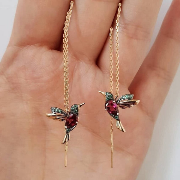 1 par de pendientes con borlas de cristal y colgante de pájaro