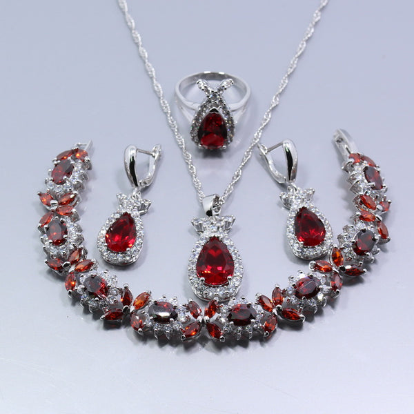 Conjunto de joyas de color plata con anillo de circonita blanca y granate rojo