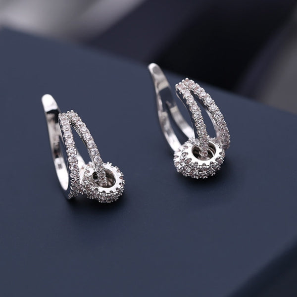 Pendientes coreanos de circonita cúbica redonda con piercing falso