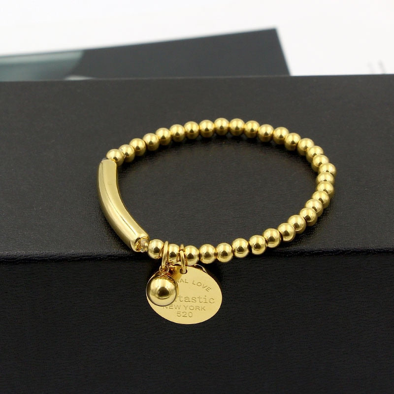 Circle Tag Charm Stretch Strand Bracelet