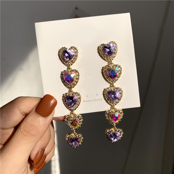 Pendientes largos de lujo con forma de corazón morado y brillantes diamantes de imitación