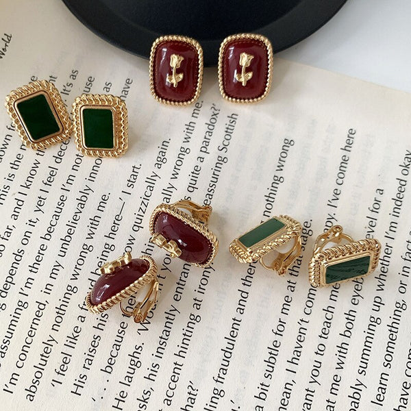 Pendientes vintage de clip con forma de rosa y piedra color vino tinto