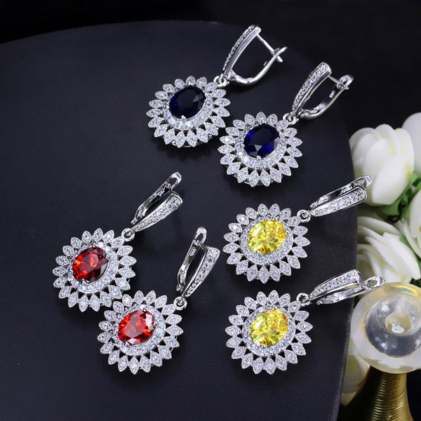 Pendientes de aro largos y redondos con forma de girasol y piedra de cristal amarilla