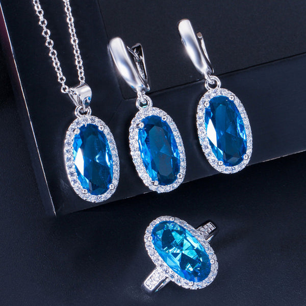 Conjunto de 3 collares y pendientes con circonitas cúbicas azules claras y grandes y ovaladas
