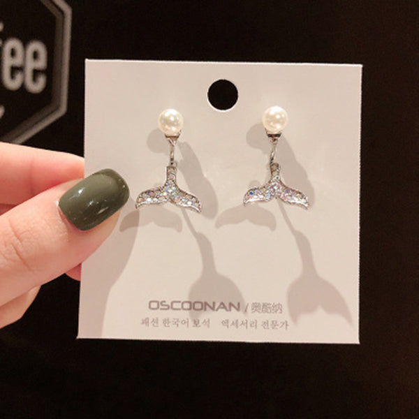 Pendientes largos retro exagerados con clip para la oreja.