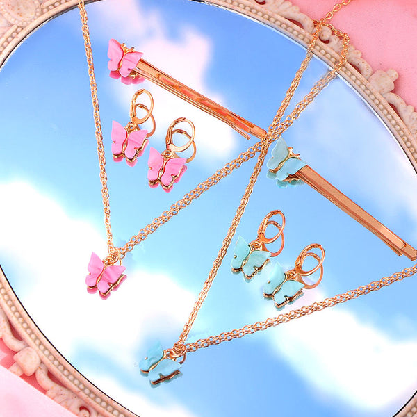 Nuevos y bonitos conjuntos de joyas de mariposas acrílicas multicolores.