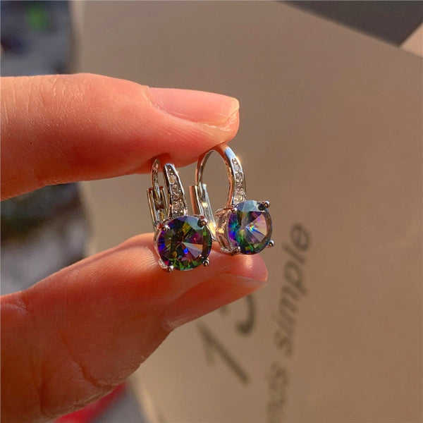 Pendientes de clip con cristales arcoíris y piedras preciosas para mujer, color oro rosa y plata.