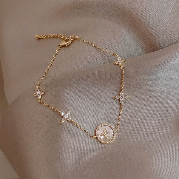 Pulsera de moda con dije de concha natural de circonita cúbica para mujer