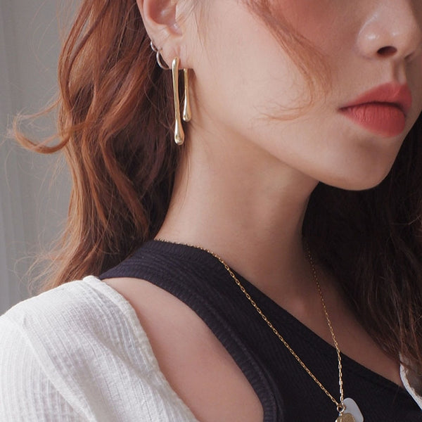 French long golden earrings.