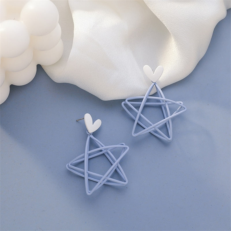 Fresh sky blue hollowed-out double pentacle star Earrings