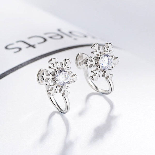 Pendientes de copo de nieve de cristal navideño con clip para mujer