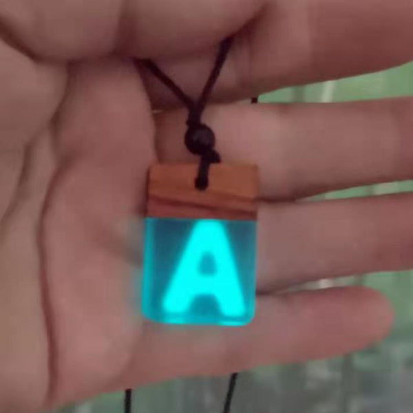 ancient wood with resin and pendant