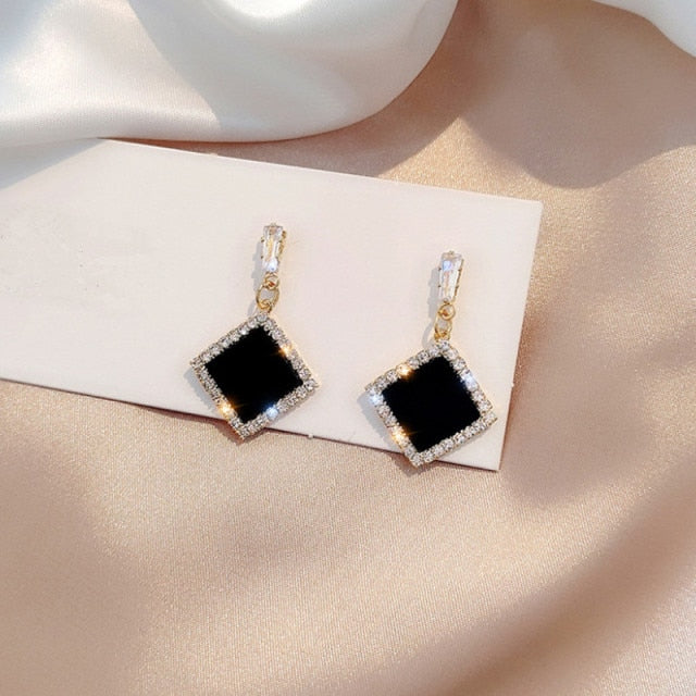 new black round rhinestone earrings