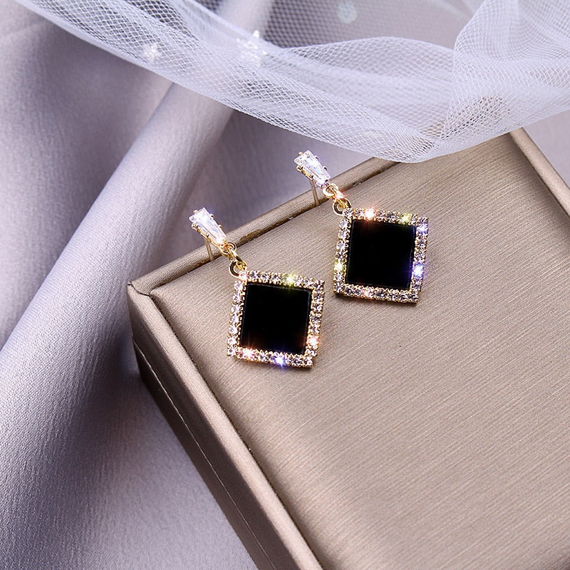 new black round rhinestone earrings
