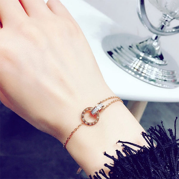 Pulseras de lujo de acero inoxidable en oro rosa con números romanos