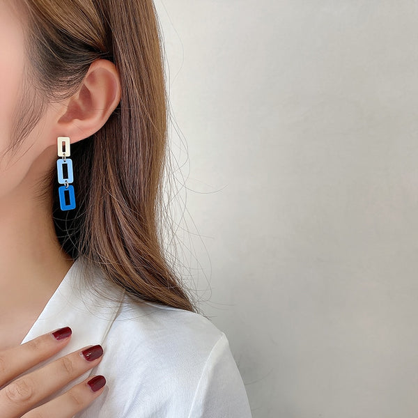 Fresh sky blue hollowed-out double pentacle star Earrings