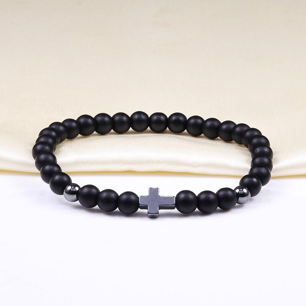 Pulseras de ónix negro con cruz de hematita y bola de corona