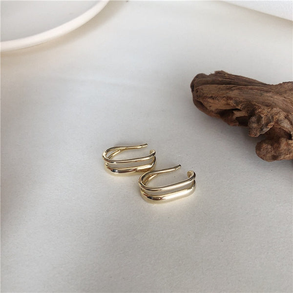 Pendientes de clip doble en forma de U dorados para mujer