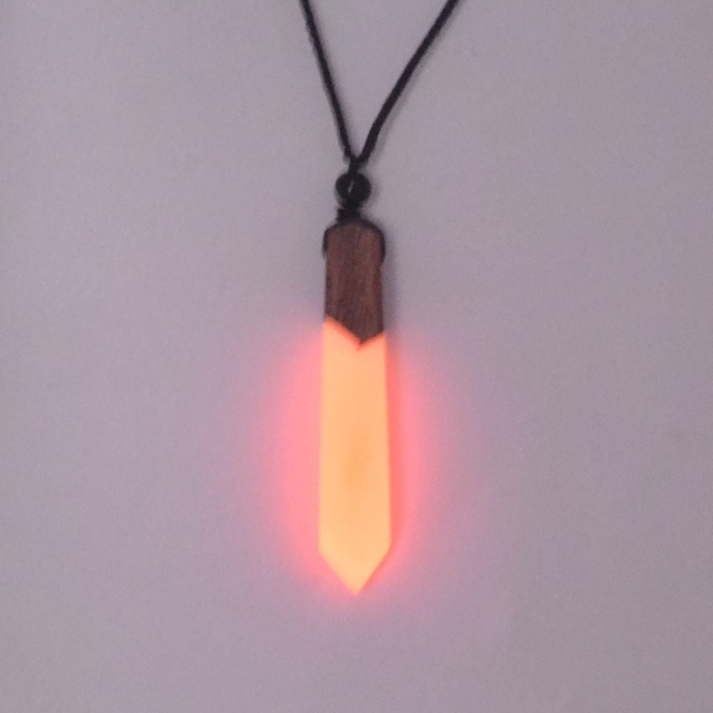 luminous necklace pendant at night
