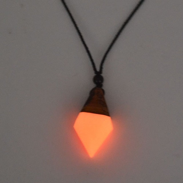 luminous necklace pendant at night