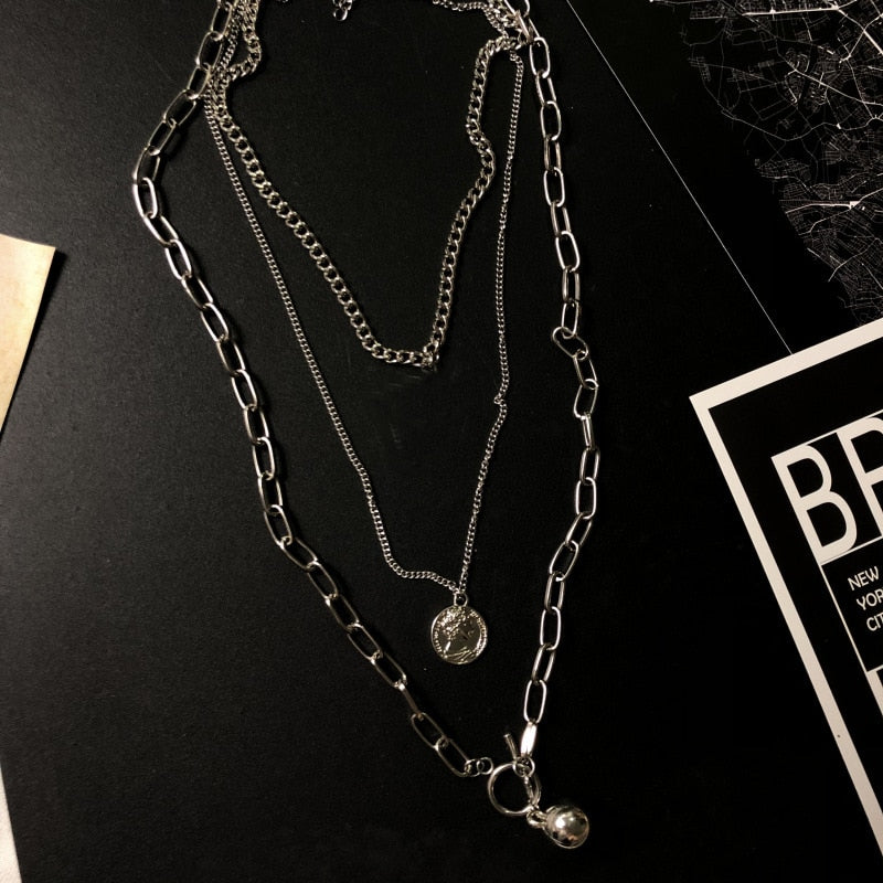 New Trendy Metal Ball Coin Cross Pendant