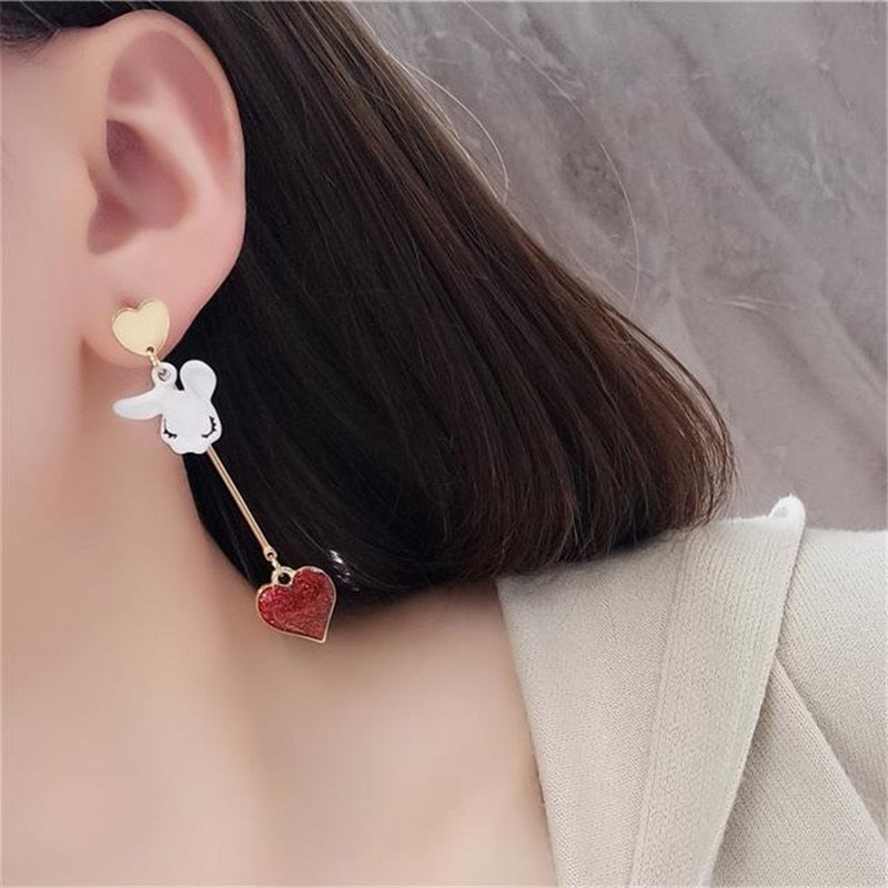 woman Asymmetric time rabbit metal texture fashion earrings