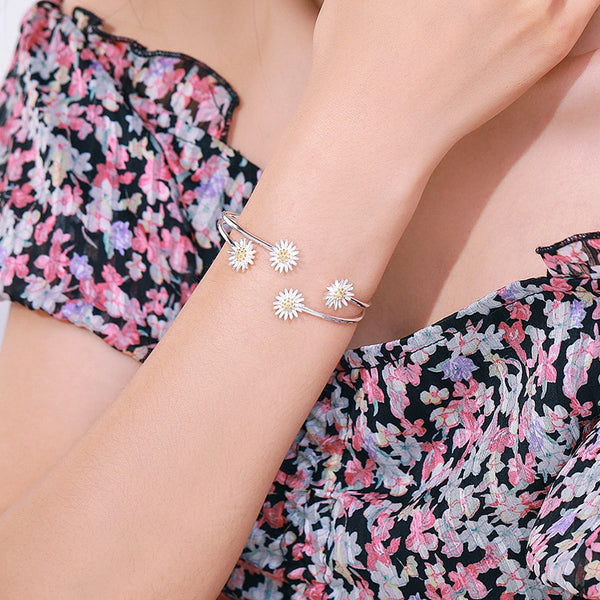 Pulsera y brazalete con dije de flor de margarita para mujer